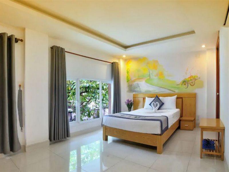 U And Me Hotel Tan Phong Buitenkant foto